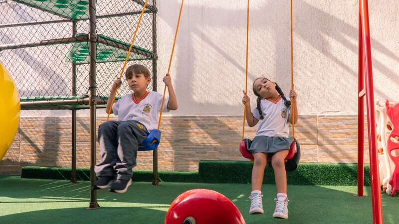 Criança da Educação Infantil sorrindo